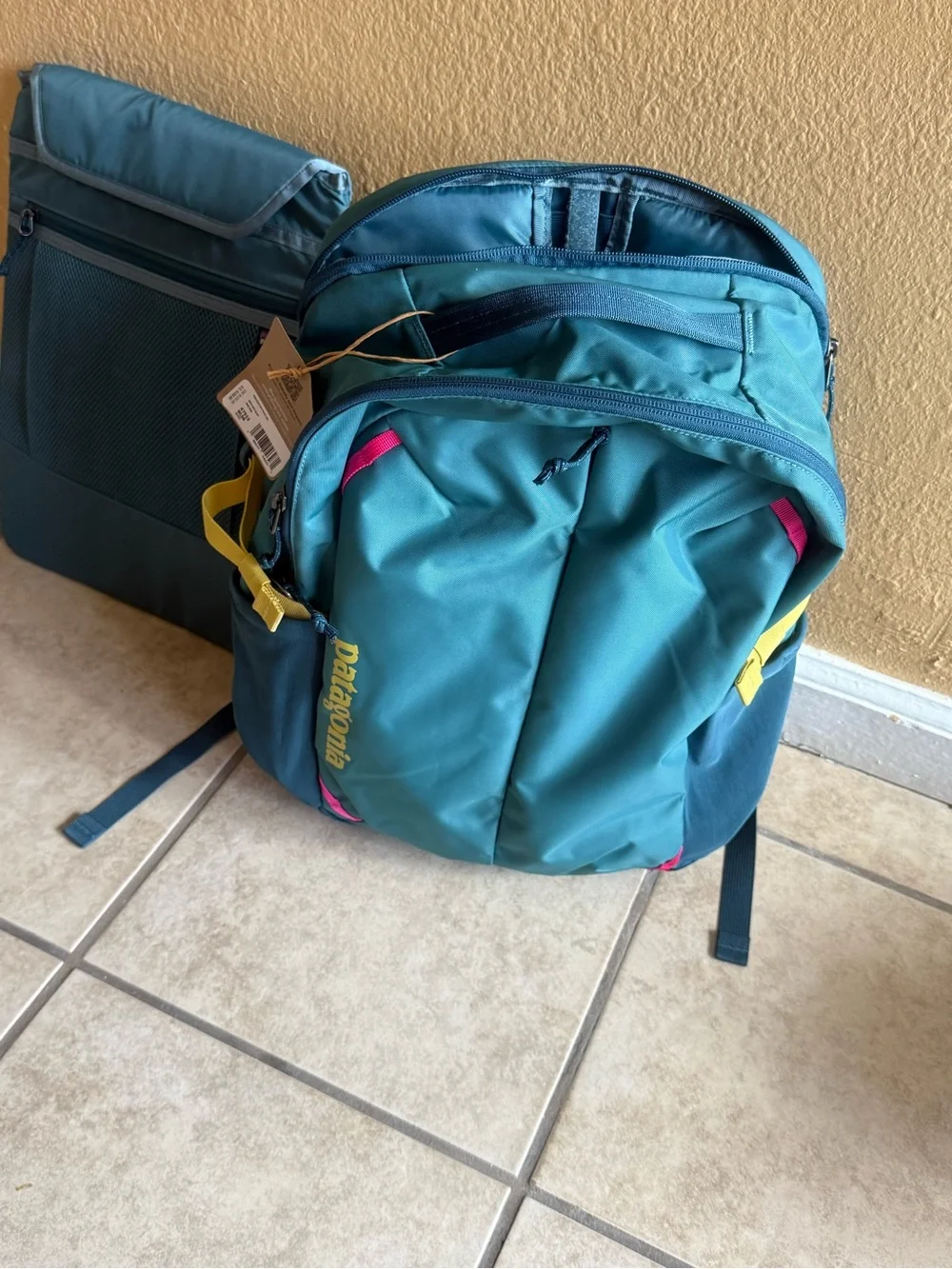 Patagonia Teal and Pink Men's Backpack with Yellow Logo Accent